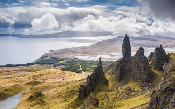 The Isle of Skye is world-famous for its rugged landscapes, dramatic sea cliffs, and mystical atmosphere. Iconic sites like the Old Man of Storr, the Quiraing, and the Fairy Pools attract hikers and photographers from across the globe. The island’s raw natural beauty, ancient castles, and Gaelic heritage make it a quintessential destination for experiencing the wild spirit of Scotland.