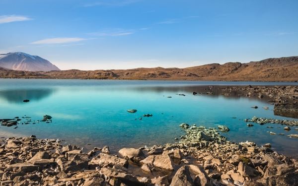 This park features some of Svalbard's most dramatic Arctic scenery, including jagged mountain peaks, massive calving glaciers, and historic whaling stations. It is a prime area for spotting polar bears, walruses, and reindeer in their natural habitat. Exploring the park via expedition cruises offers a raw and majestic experience of the high Arctic, where nature remains untouched and the silence is profound.