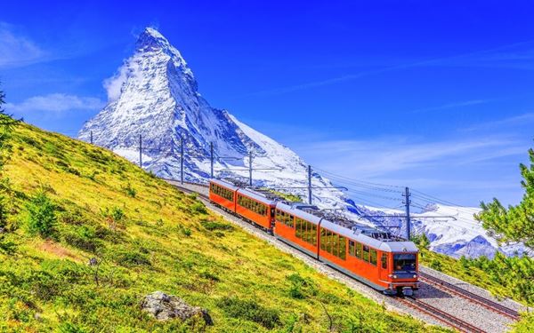 The Matterhorn is one of the world's most iconic and photographed mountain peaks, famous for its distinctive pyramidal shape. Located in the car-free village of Zermatt, it is a paradise for skiers and mountaineers. Whether viewing it from the Gornergrat railway or hiking in its shadow, the mountain stands as a powerful symbol of the majestic beauty of the Swiss Alps.