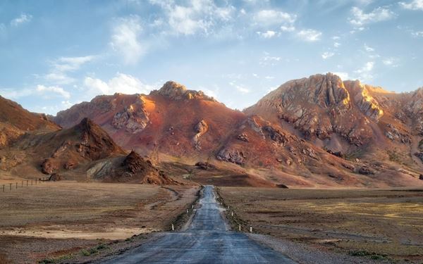The Pamir Highway is one of the world's most epic and highest high-altitude road trips, winding through the "Roof of the World." It offers breathtaking views of rugged mountains, deep gorges, and remote Wakhi villages along the border with Afghanistan. For adventurers, it is the ultimate journey through a stark and majestic landscape, showcasing the resilient culture and raw natural beauty of the high Pamir plateau.