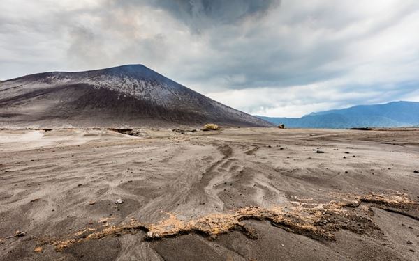 Mount Yasur on Tanna Island is known as the "world's most accessible active volcano." Visitors can stand on the crater rim and witness spectacular explosions of molten lava against the night sky. The sound and vibration of the eruptions are a thrilling and raw display of the Earth's power. It is a sacred site for the local people and offers a unique, once-in-a-lifetime adventure for those seeking to witness volcanic activity up close.