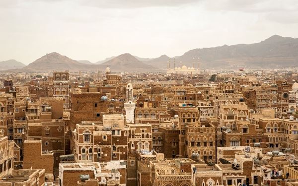 Sana'a is one of the world's oldest continuously inhabited cities, a UNESCO site famous for its unique "gingerbread" houses made of burnt brick and white gypsum. The city’s multi-story buildings and intricate geometric patterns reflect thousands of years of architectural heritage. Walking through its narrow streets and the bustling Bab al-Yemen market offers a profound journey into the heart of ancient Arabian culture and history.